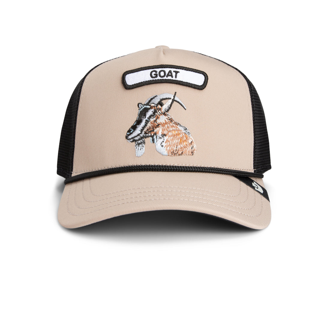 Beige and black cap with goat design and 'GOAT' text on a white background