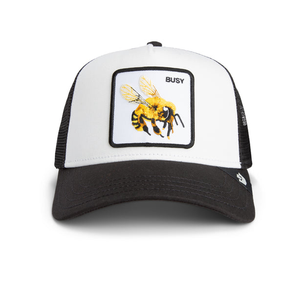 White and black trucker hat with a bee graphic and 'BUSY' text on a white background